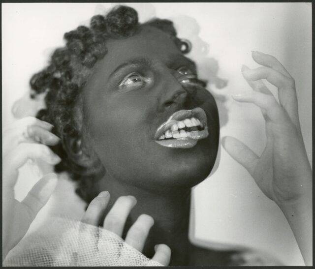 Trudi Hess, schwarz geschminkt (Doppelbelichtung), 1933