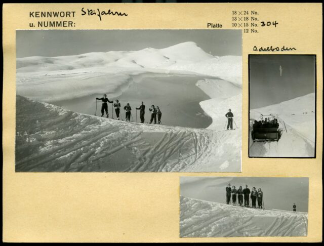 Skifahrerinnen und Skifahrer und Kutsche im Schnee in Adelboden, Staffage
