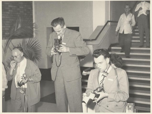 Männer mit Fotoapparat