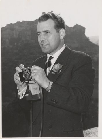Mann mit Fotoapparat