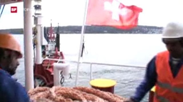 Schweizer Armee auf Frachtschiffen