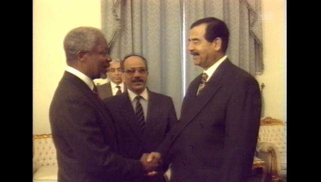 Handschlag mit Saddam Hussein